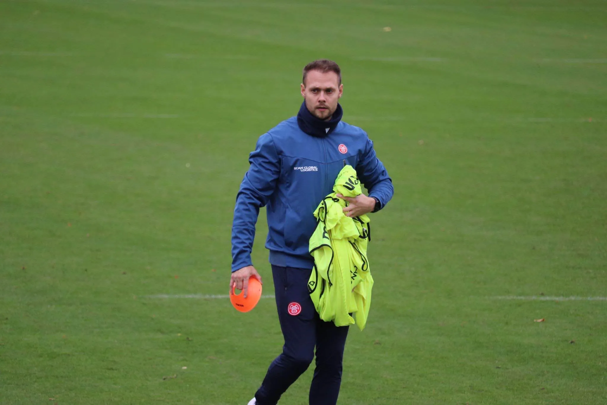 Fynn on training ground with equipment